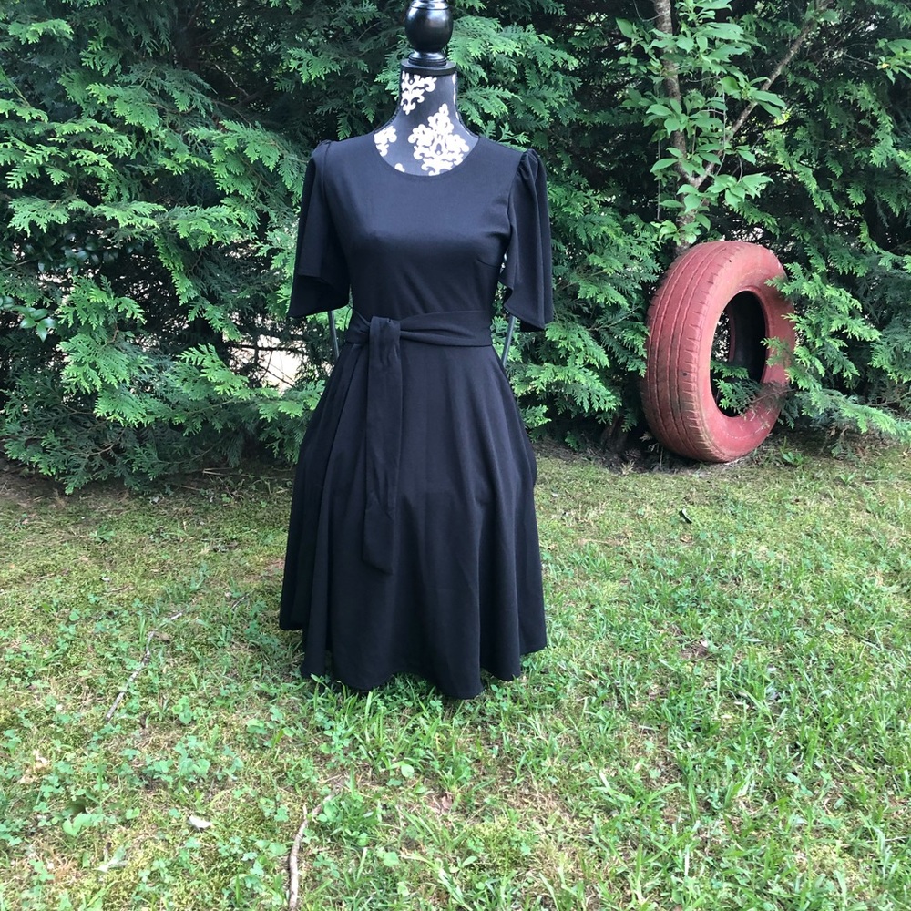 Dress has pockets.